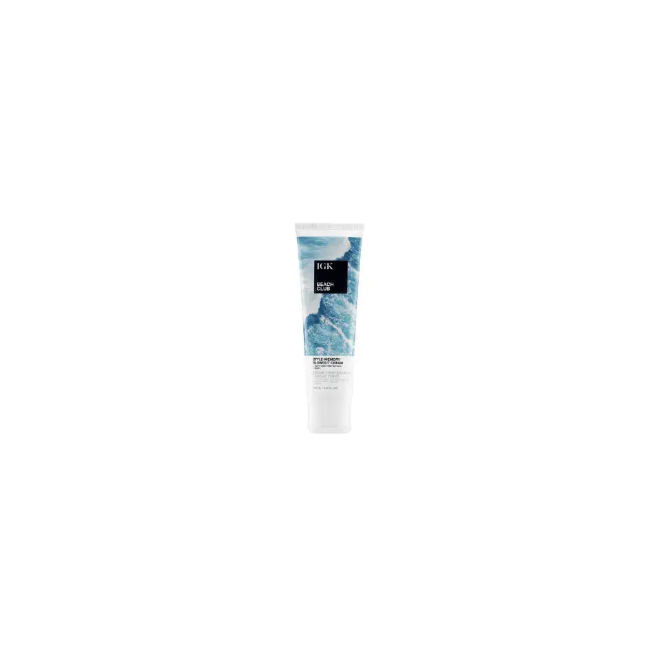 A close-up of IGK Beach Club Bouncy Blowout Cream applied to hair, emphasizing its ability to create bouncy, full-bodied styles ideal for beach outings.