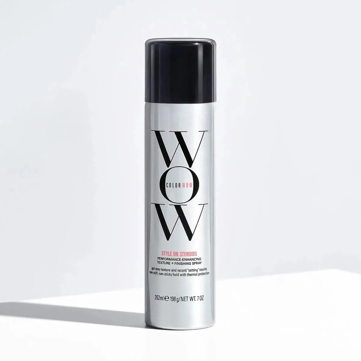STYLE ON STEROIDS COLOR-SAFE TEXTURIZING SPRAY bottle showcasing its key features for adding volume, texture, and definition to hair without fading color.
